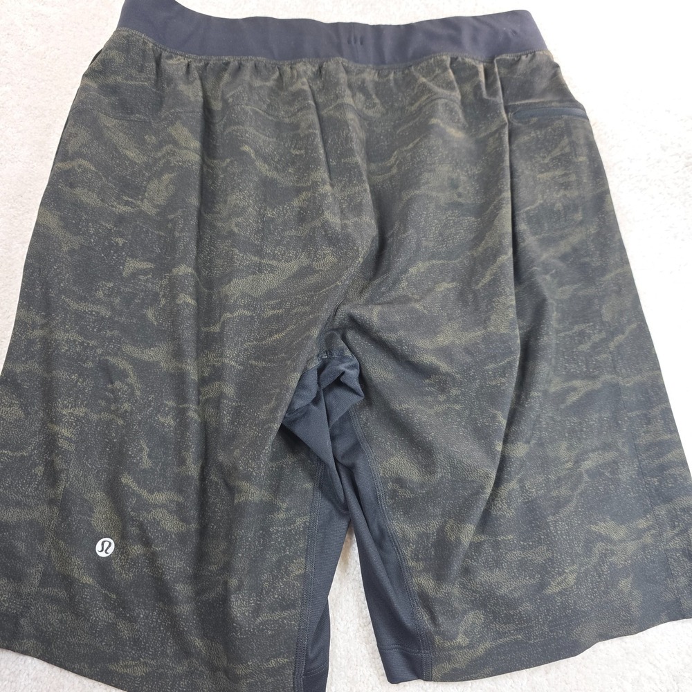 Lululemon THE Linerless Shorts Mens L Green Black Camouflage‎ Activewear Logo